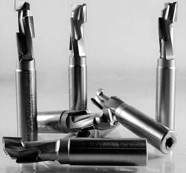 Compression style PCD disposable diamond-tipped router bit for CNC machines single and multi-flute design for MDF phenolic and abrasive composites